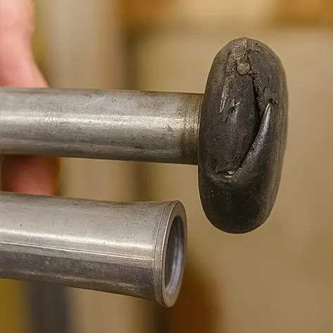 Garage door roller before replacement
